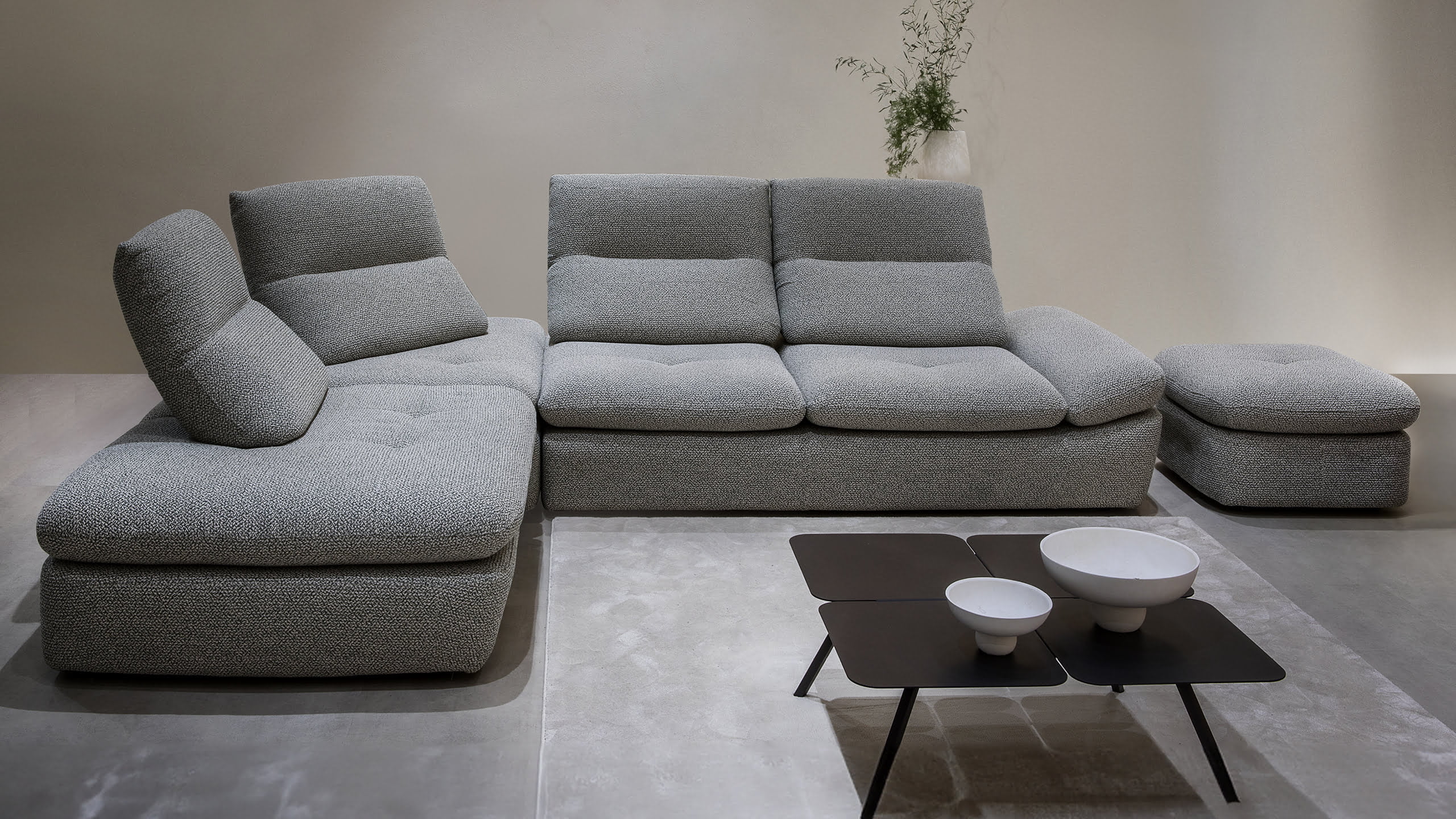 The Alba sofa features adjustable backrests, headrests, and armrests for customized comfort and can double as a day bed with its removable covers. | Alba by Calia Italia