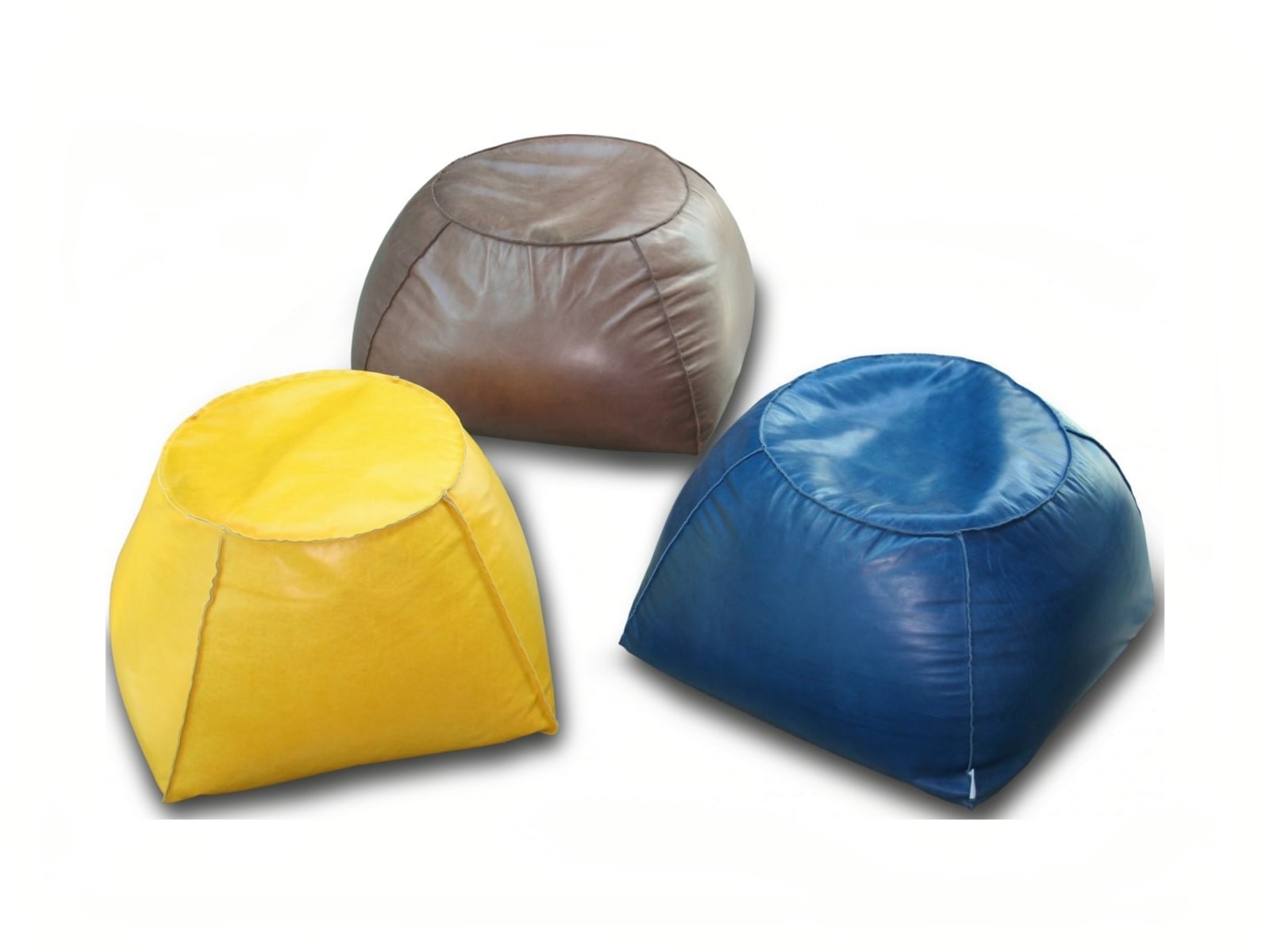 Trapezio footstool: unique-shaped, lightweight, versatile for any room, offers fabric or leather upholstery with a raw cut finish. Ideal for comfort and aesthetic appeal. | Trapezio by Calia Italia