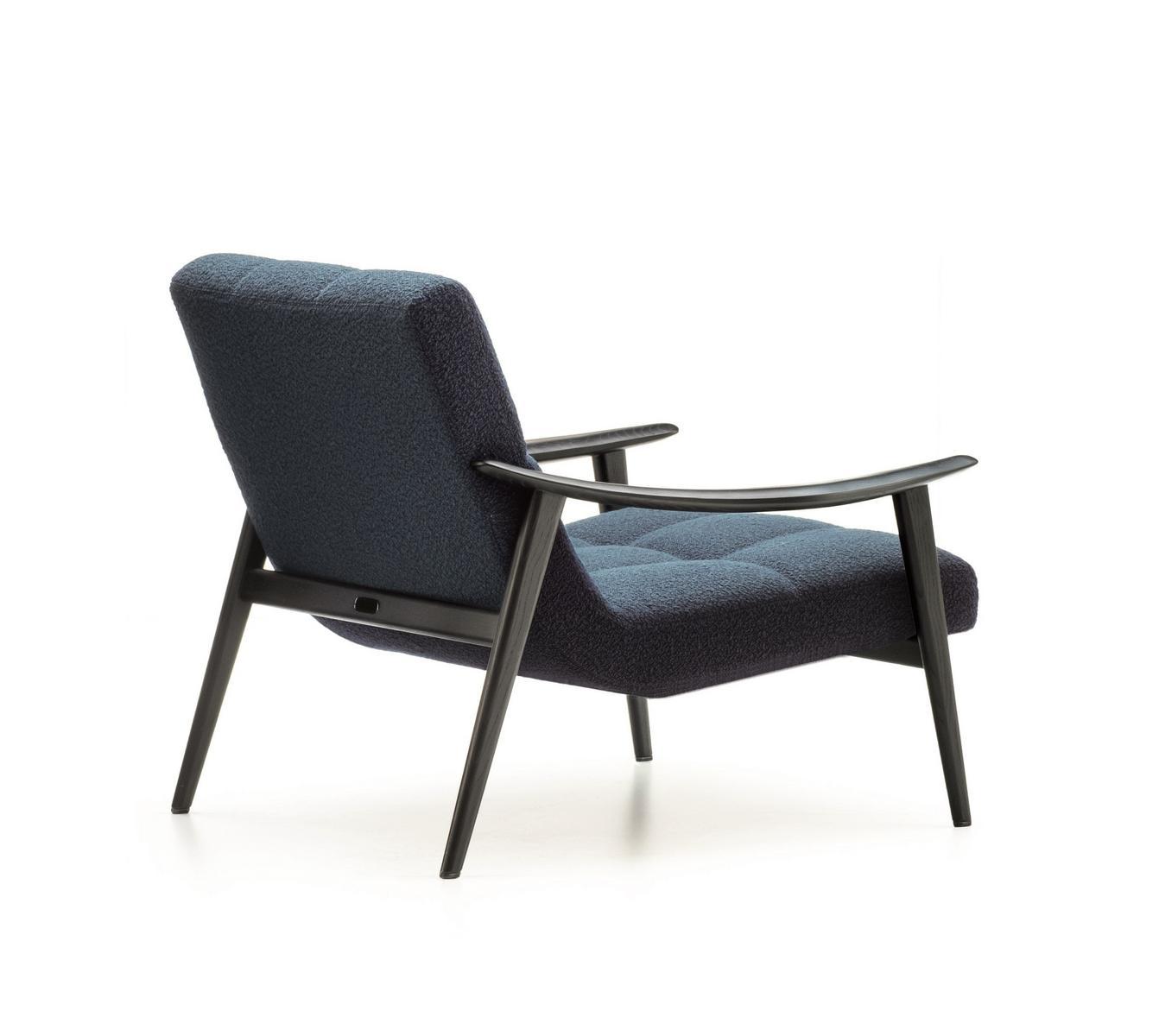 Upholstered armchair with armrests | Fynn by Minotti
