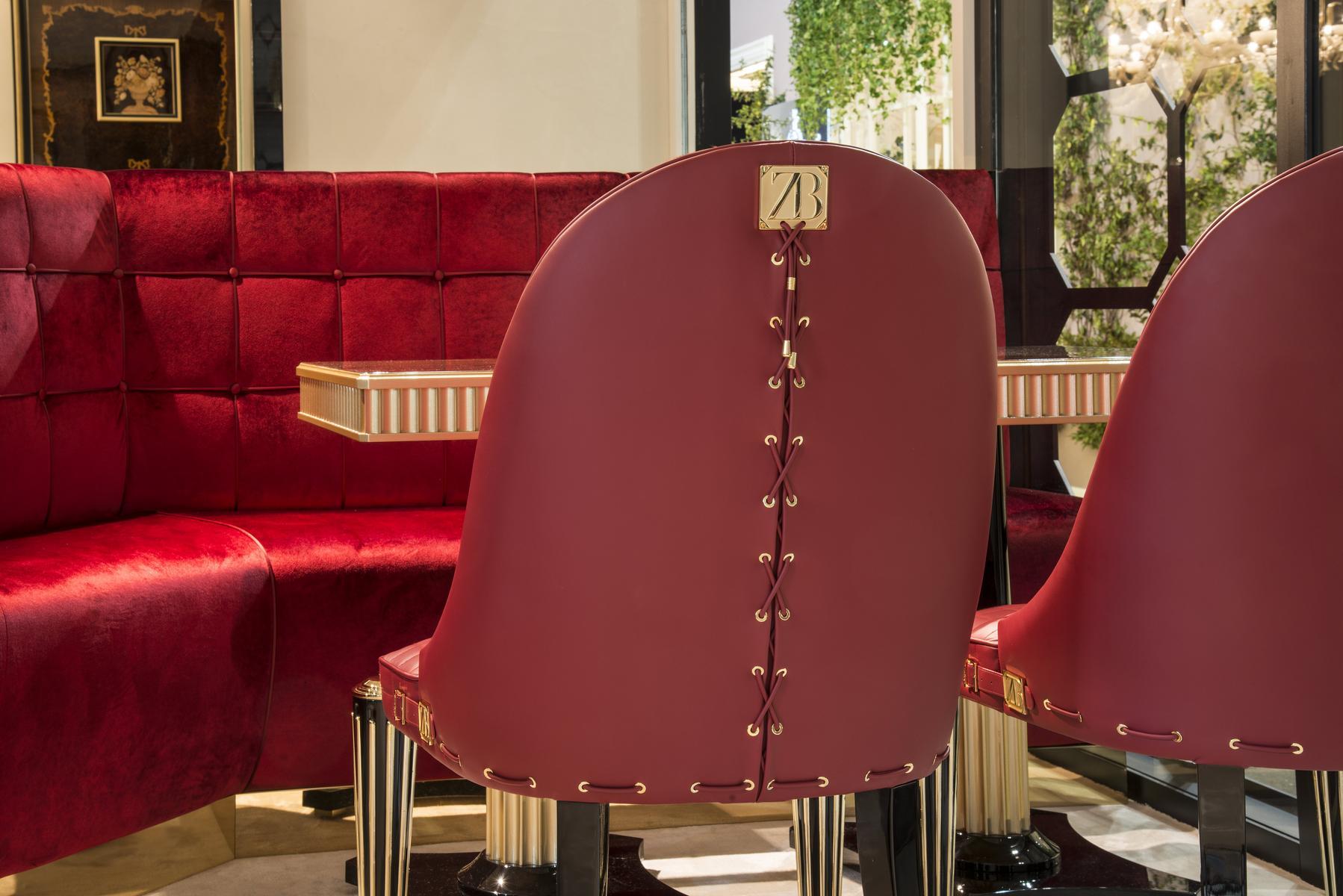 Upholstered leather chair with armrests | Ophelia by Bruno Zampa
