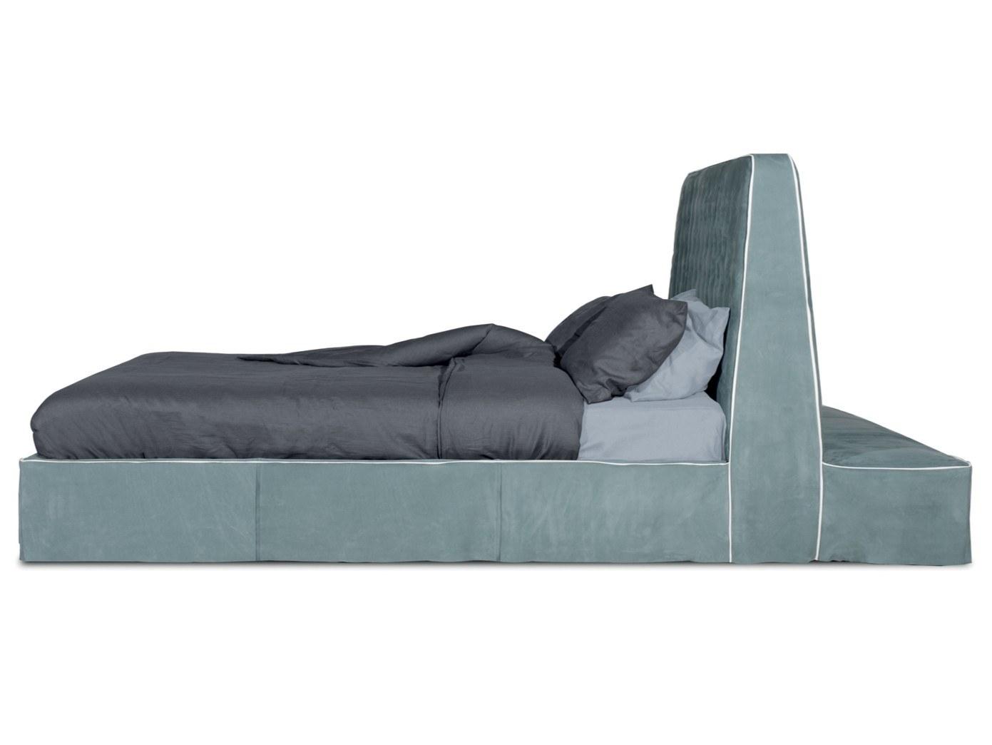 Leather bed with upholstered headboard |  by Baxter