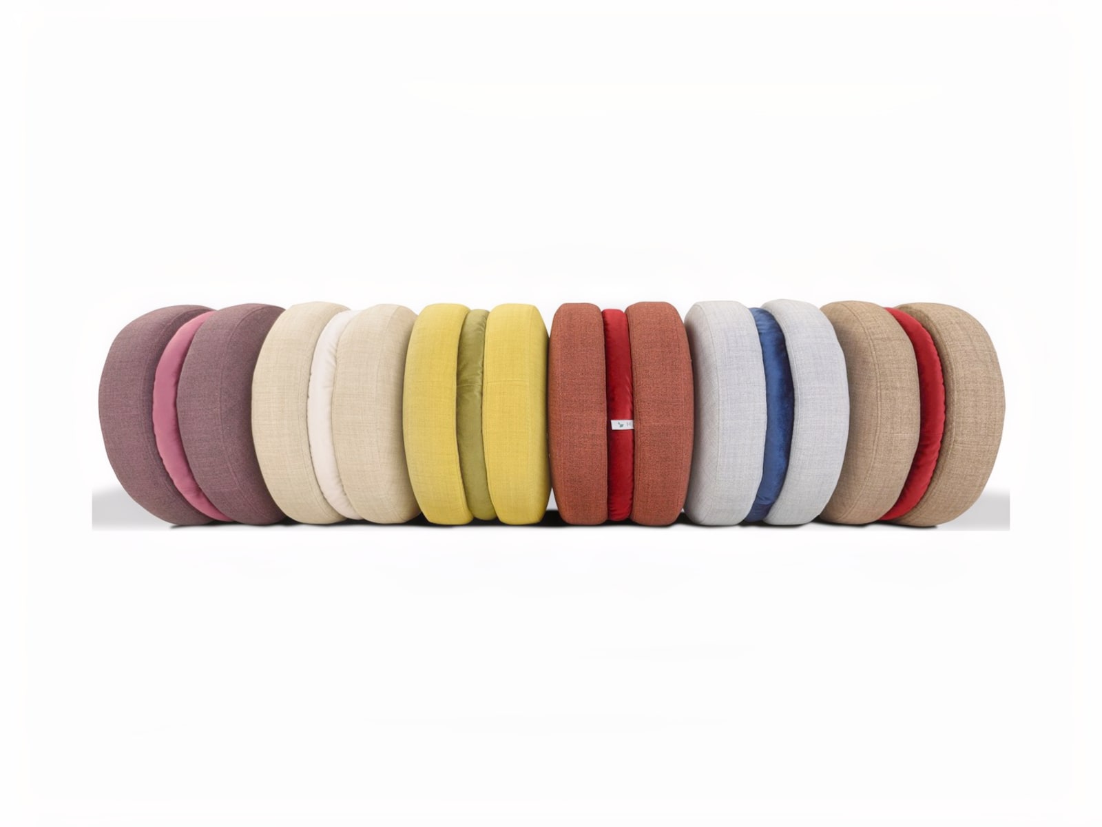 Trapezio footstools offer unique, versatile design, suitable for any room, with soft comfort and choice of fabric or leather finishes. Ideal for both aesthetic and functional needs. | Macarons by Calia Italia