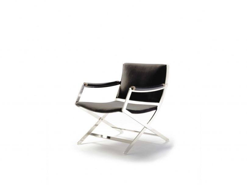 Folding leather easy chair with armrests | Paul by Flexform