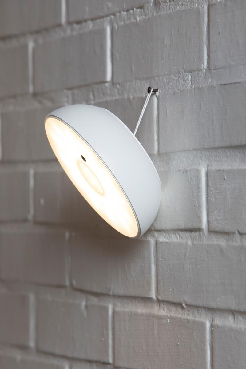 Multifunctional portable wall lamp | Float by Axolight