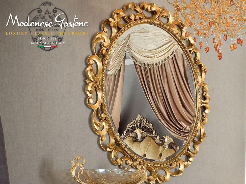 Oval wall-mounted framed mirror | 13672 by Modenese Gastone