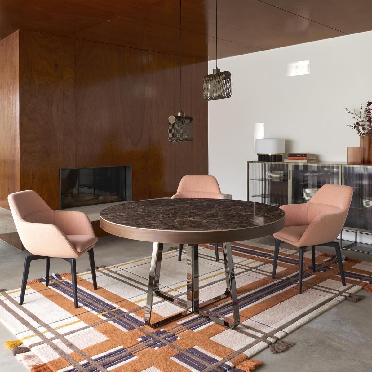 Extending round porcelain stoneware dining table | Ava by Ligne Roset