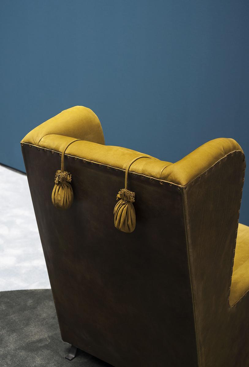 Leather armchair with armrests | Pochette by Baxter