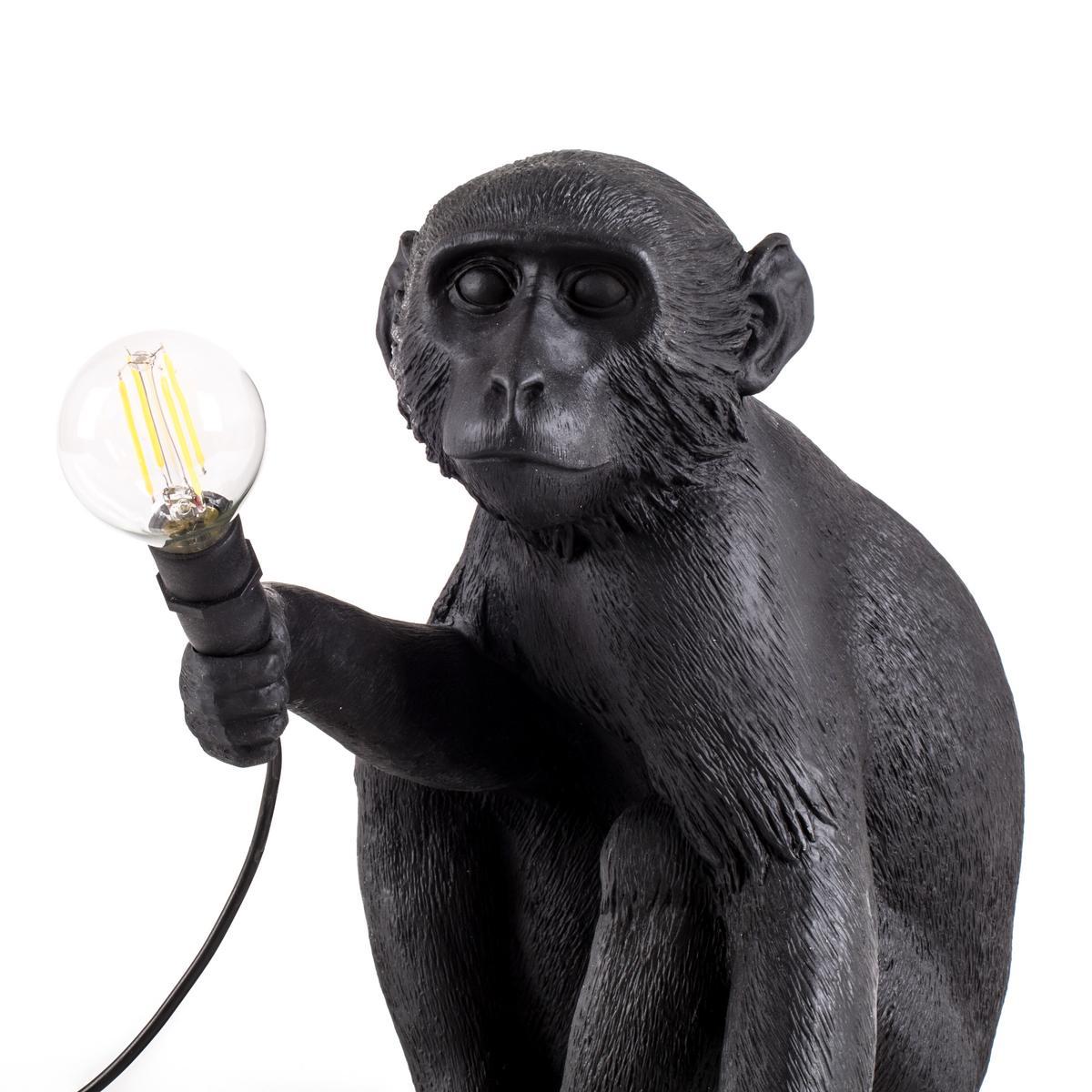 LED resin floor lamp | The Monkey Lamp Black Sitting by Seletti