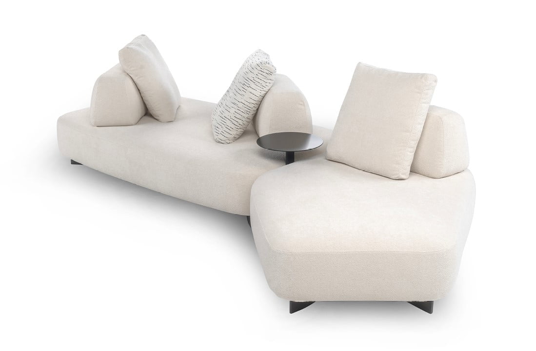 Modular sofa with moveable backrests and versatile configurations, providing flexible comfort and Italian-inspired design aesthetics for innovative living spaces. | Cremino by Calia Italia