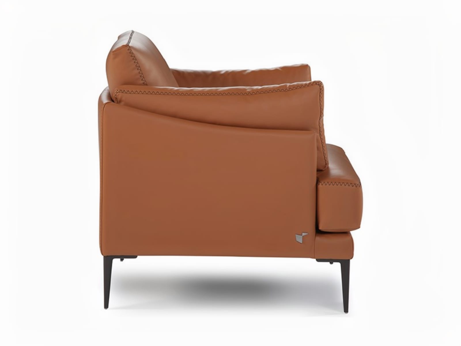 Elegant Fleur chair with stylish pin-shaped legs and sophisticated stitches, ideal for both snug homes and professional spaces, offering comfort in compact form with option for leather or removable fabric. | Fleur by Calia Italia